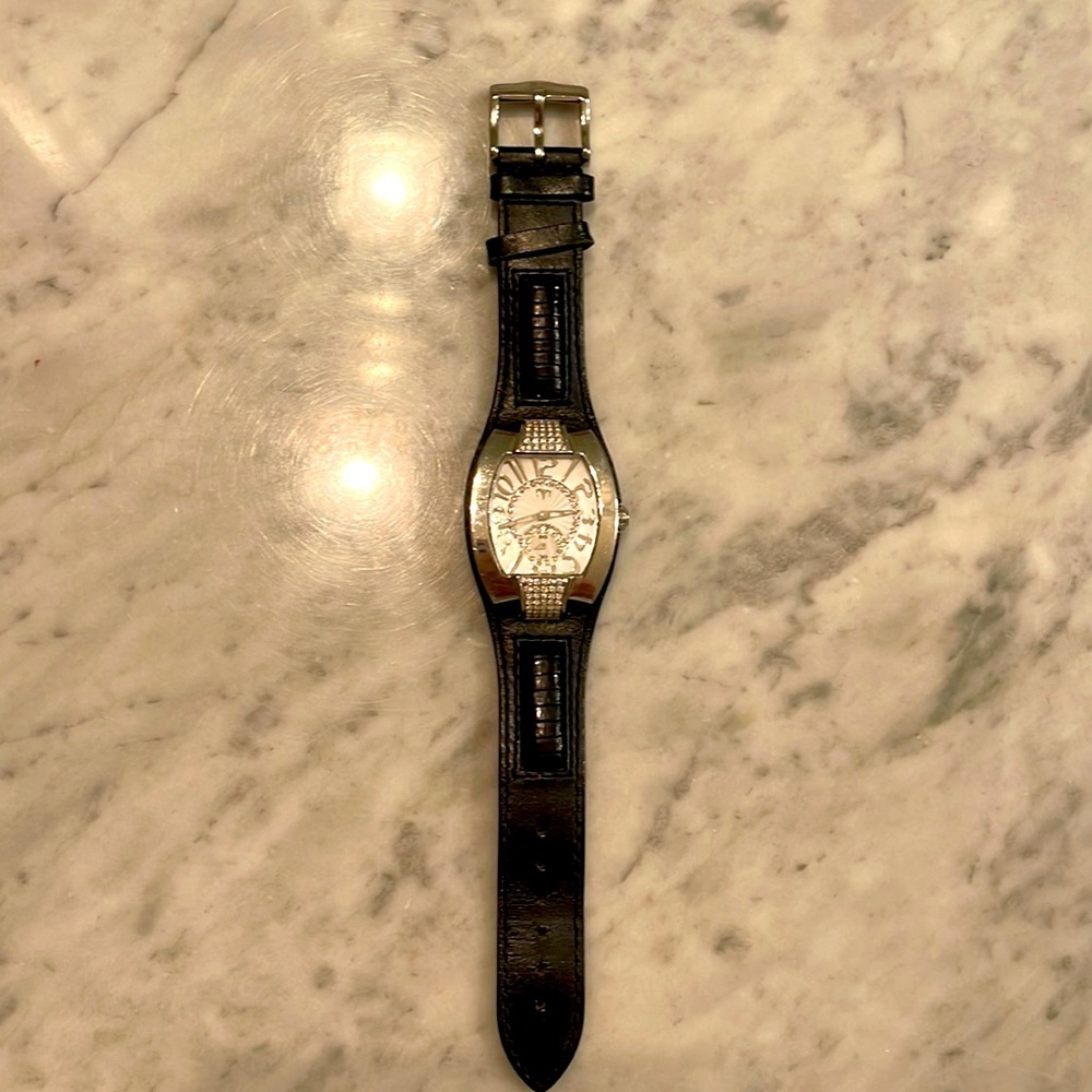Women’s Technomarine watch with diamonds. Needs new battery.
